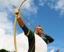 archer shooting his full compass english longbow at Elite Archery Coaching venue in london