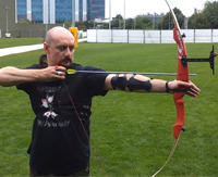 Beginner learning to shoot a recurve archery bow
